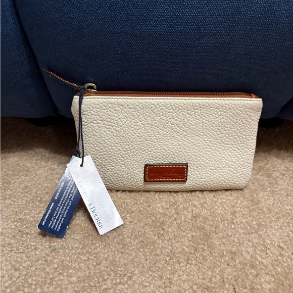 Dooney & Bourke Handbags - Dooney & Bourke Cream Leather Wristlet